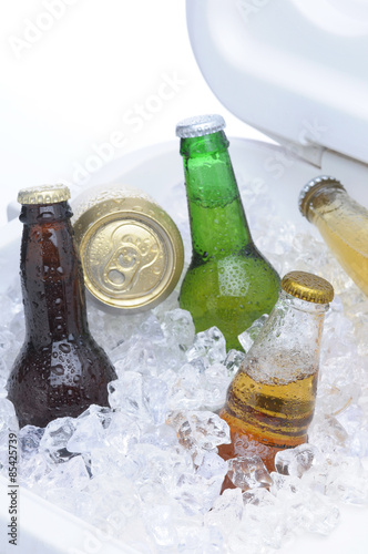 Assorted Beer Bottles and Cans in Cooler
