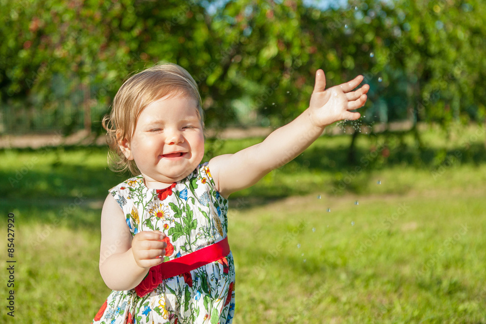 Little girl on nature laughing Little girl on nature laughing
