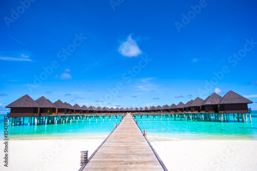 Fototapeta Naklejka Na Ścianę i Meble -  Water bungalows and wooden jetty on Maldives