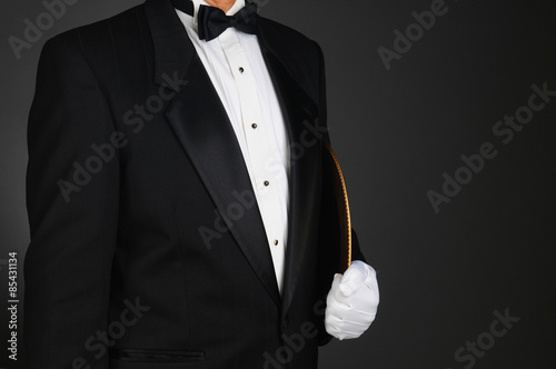 Waiter Holding Serving Tray Under His Arm