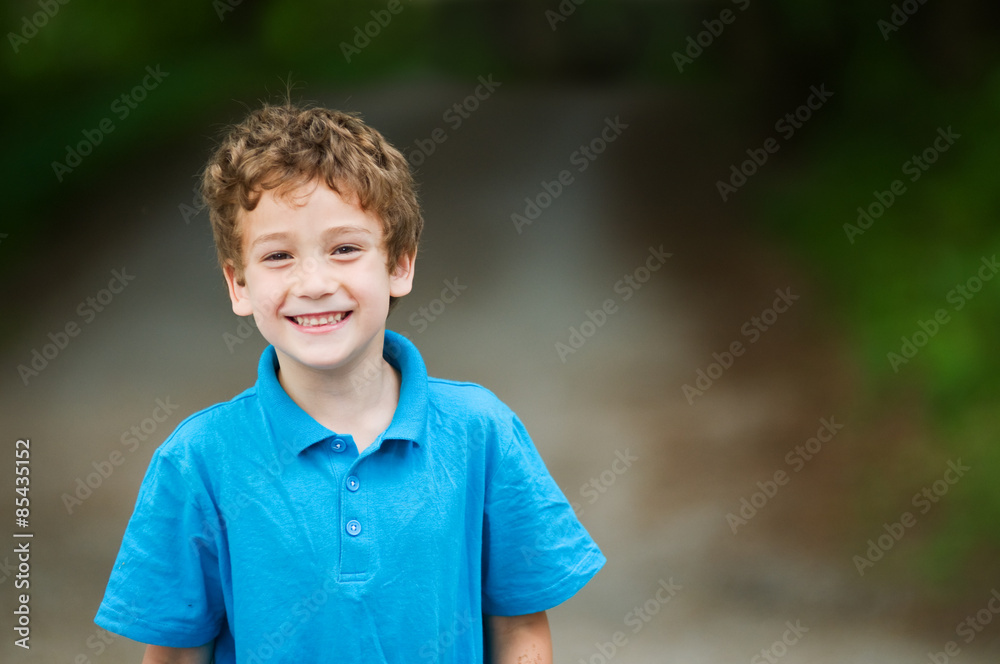 adorable little boy with cool looking hair