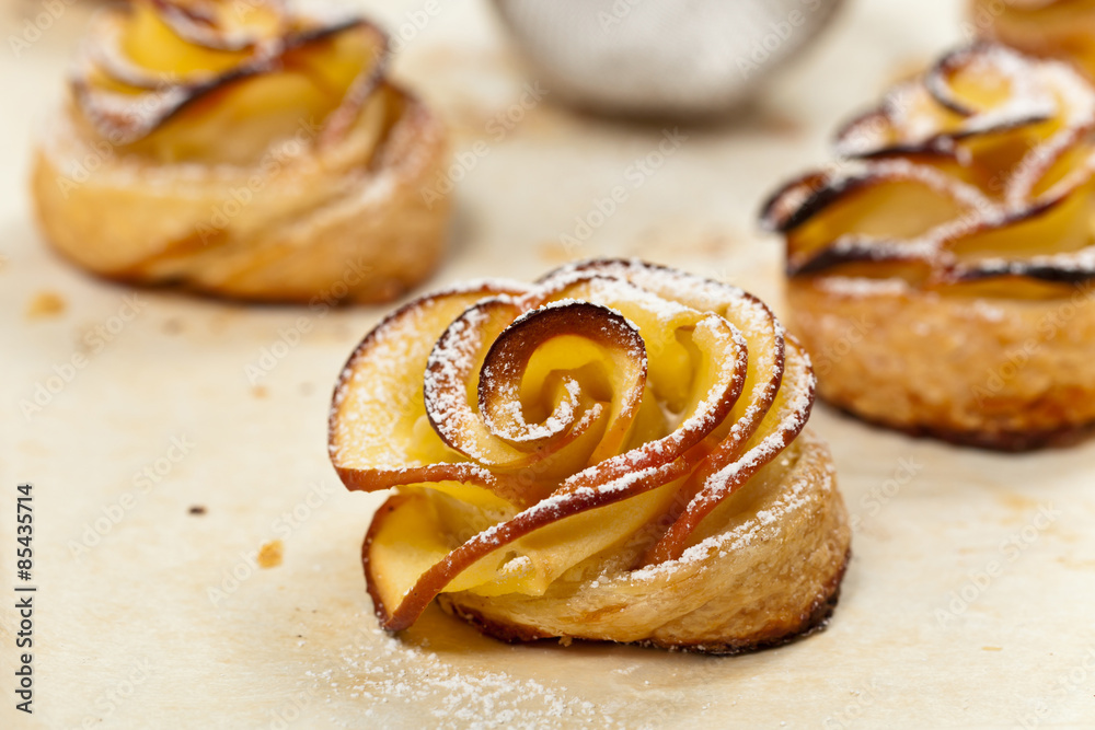 Pastry with apple shaped roses. Selective focus.