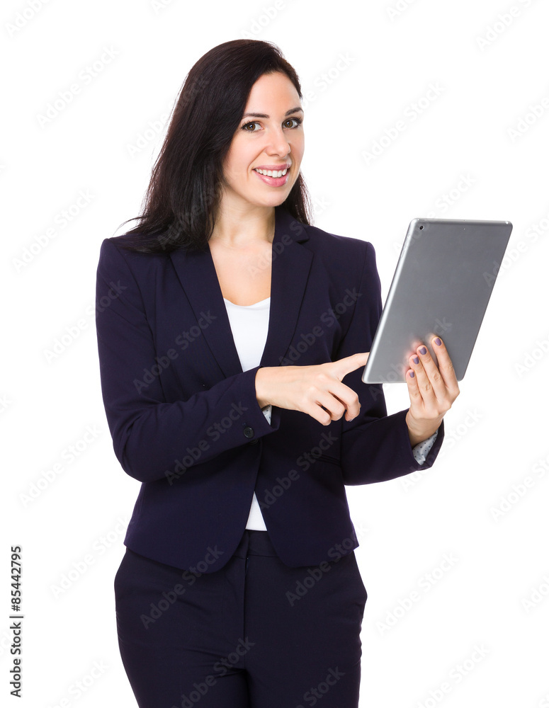 Confident businesswoman use of the tablet pc Confident businesswoman use of the tablet pc
