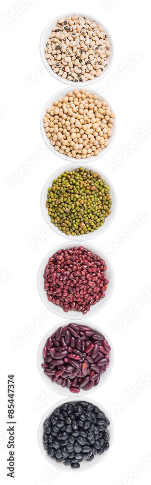 Beans variety in white bowl over white background Beans variety in white bowl over white background