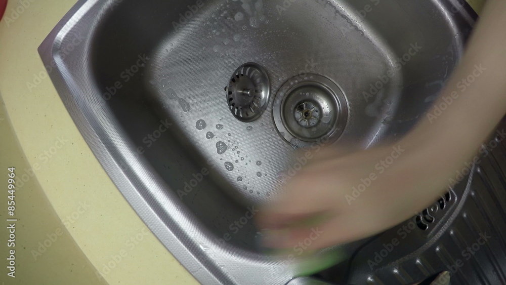 hand with sponge wash sink. 4K