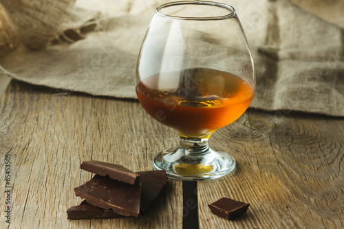 Cognac glass and chocolate
