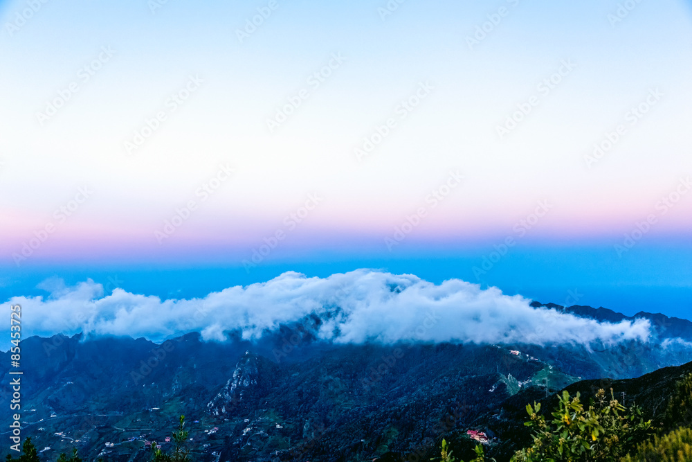 Obraz premium Landscape with clouds over mountain