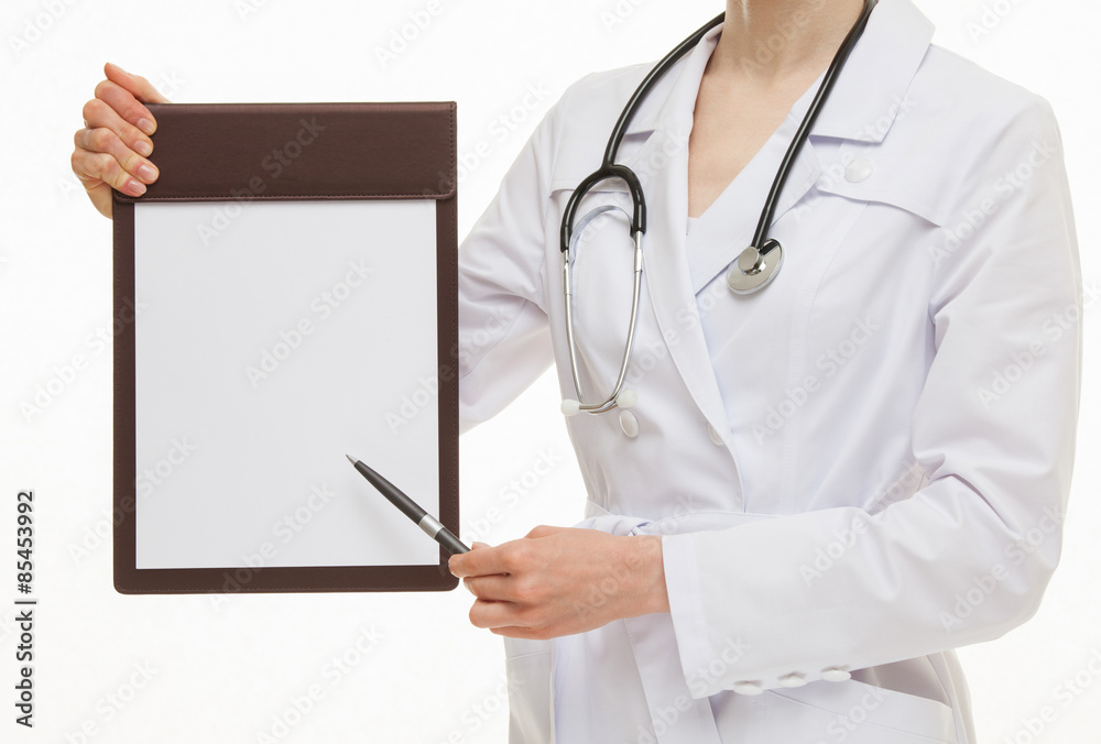 Unrecognizable doctor holding empty clipboard and a pen Unrecognizable doctor holding empty clipboard and a pen