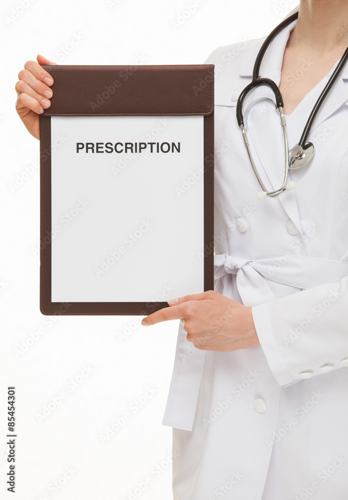 Doctor holding a clipboard with prescription Doctor holding a clipboard with prescription