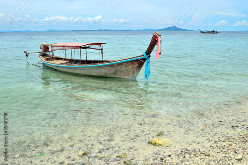 Wooden Boat on tranquil island.