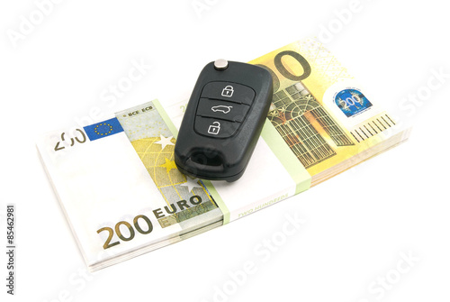 pack of two hundred euros banknotes and car keys