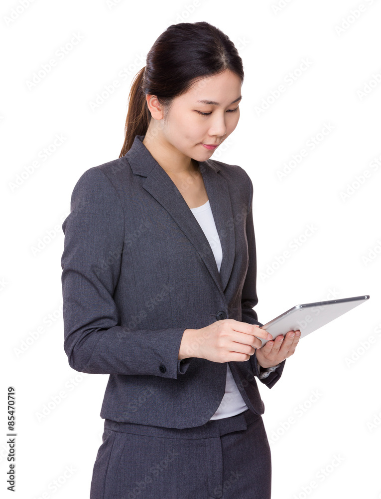Businesswoman use of digital tablet Businesswoman use of digital tablet