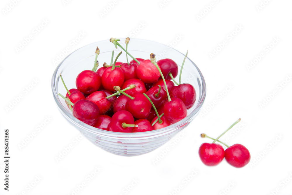 Cherries on bowl set on white background Cherries on bowl set on white background