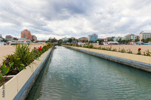 Water channel in the resort of Rimini. Inside the famous Italian seaside resort of Rimini hotels over five hundred
