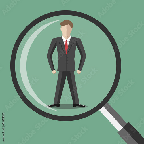 Abstract man under magnifier