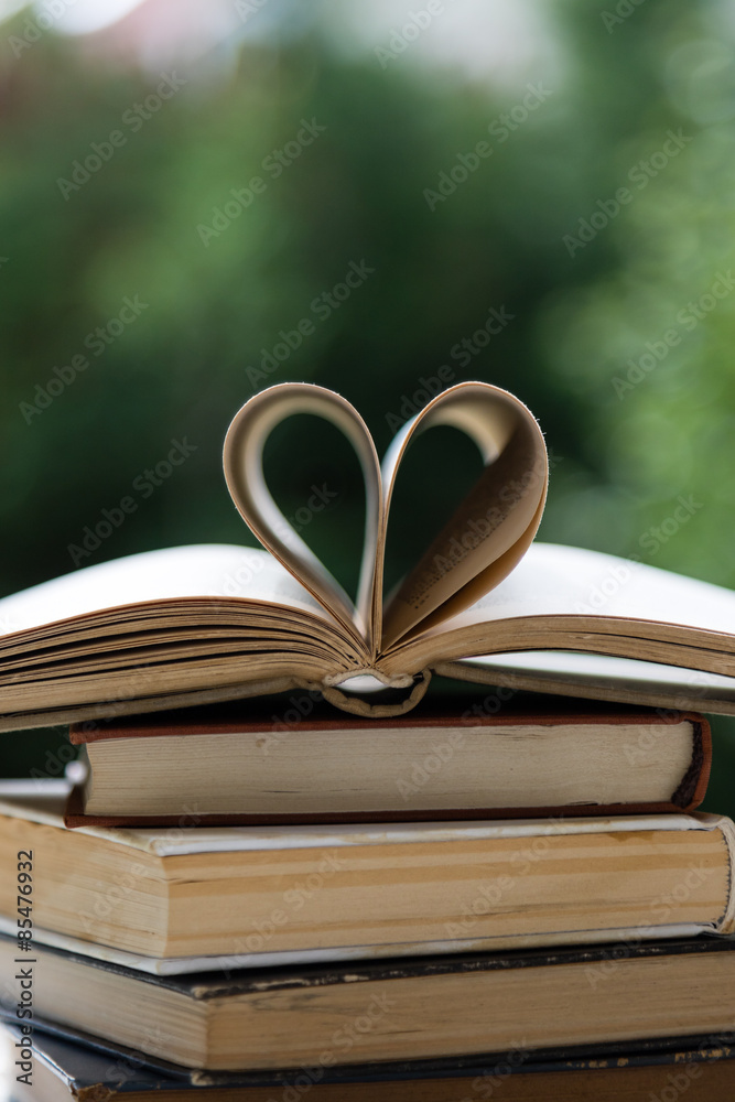 stack of books with heart shape stack of books with heart shape
