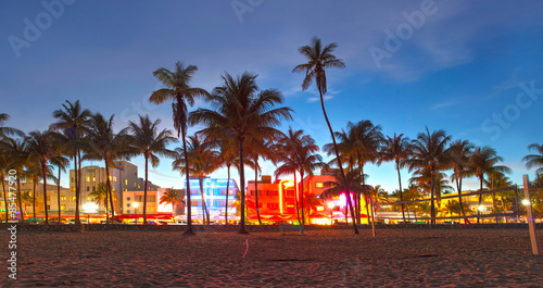 Miami Beach, Florida  hotels and restaurants at sunset on Ocean Drive, world famous destination for it's nightlife, beautiful weather and pristine beaches © FotoMak