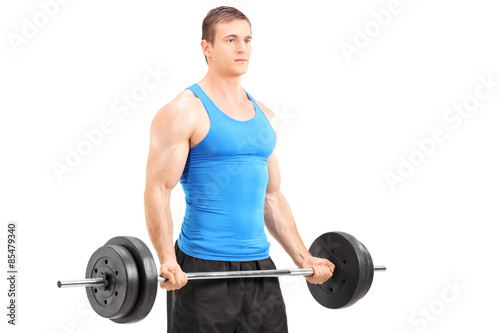 Male athlete exercising with a barbell isolated on white
