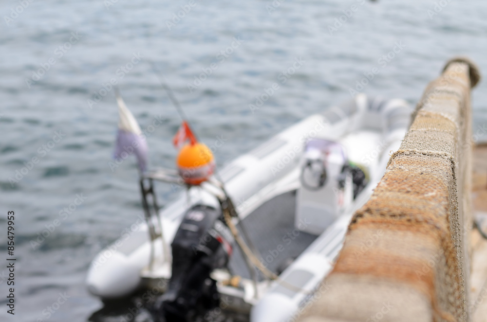 Looking Down Railing at Drying Scuba Gear and Boat