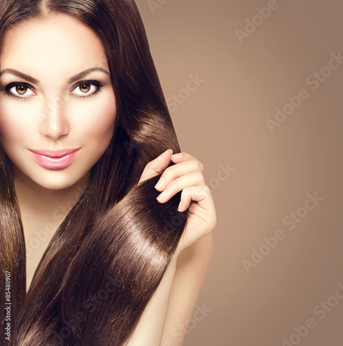Beauty model girl with healthy brown hair