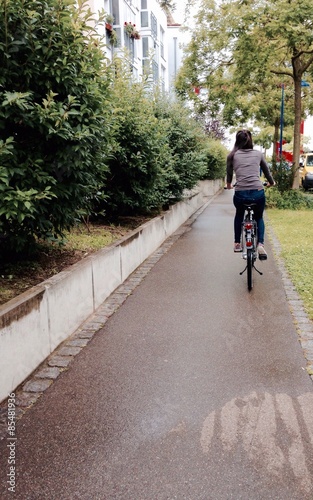 teenage girl riding a bicycle