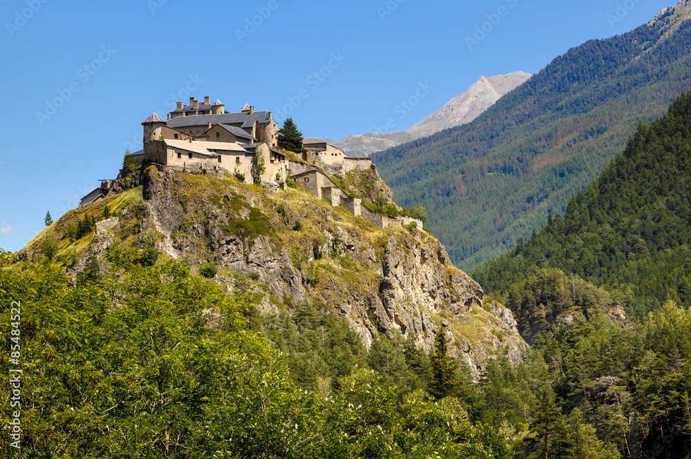Middle Age castle on hilltop, Queyras region, French Alps