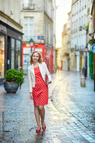Beautiful young woman walking in Paris © Ekaterina Pokrovsky