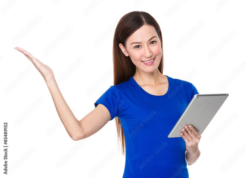 Young woman hold with tablet and hand presentation Young woman hold with tablet and hand presentation