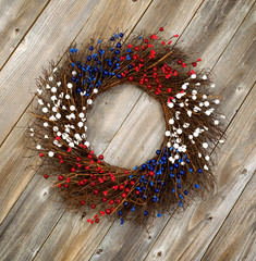 Independence Day wreath on rustic wooden boards