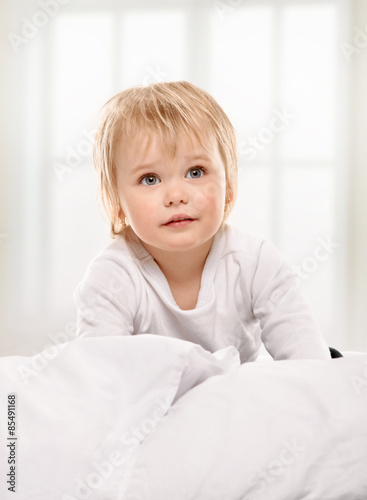 Little girl in the bed