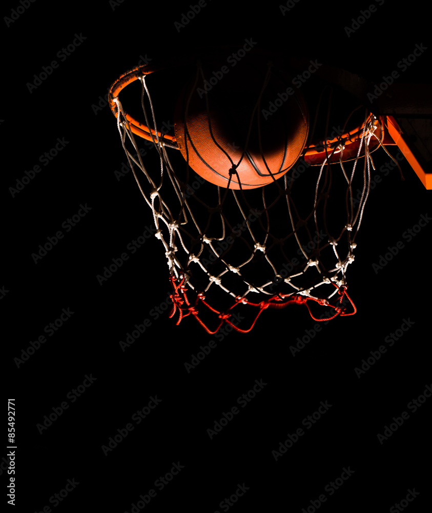 Obraz premium Basketball hood in the dark with light effect