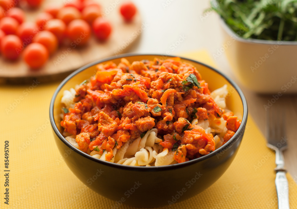 pasta bolognese tomato beef sauce on the kitchen table pasta bolognese tomato beef sauce on the kitchen table