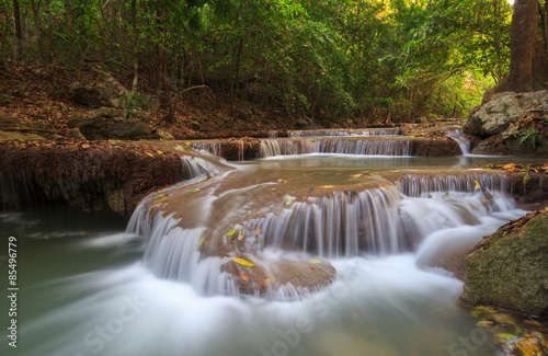 Deep forest waterfall at Erawan waterfall National Park Kanchanaburi Thailand © Southtownboy Studio