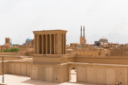 Panoramic view of badgirs and mosques of Yazd, Iran photo