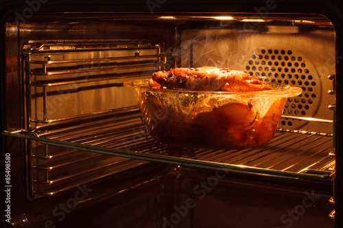 roast chicken in the oven photo