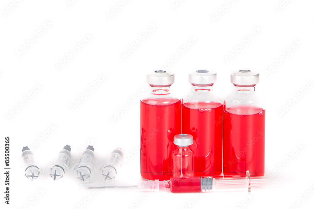 syringe with vial of medication closeup syringe with vial of medication closeup