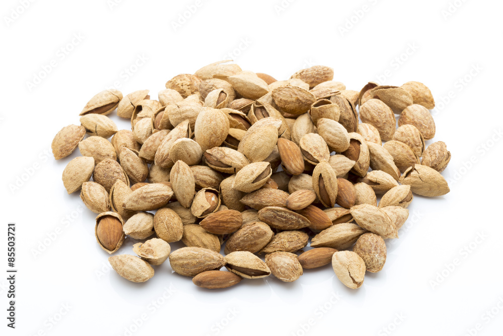 Almonds on the white isolatd background. Almonds on the white isolatd background.