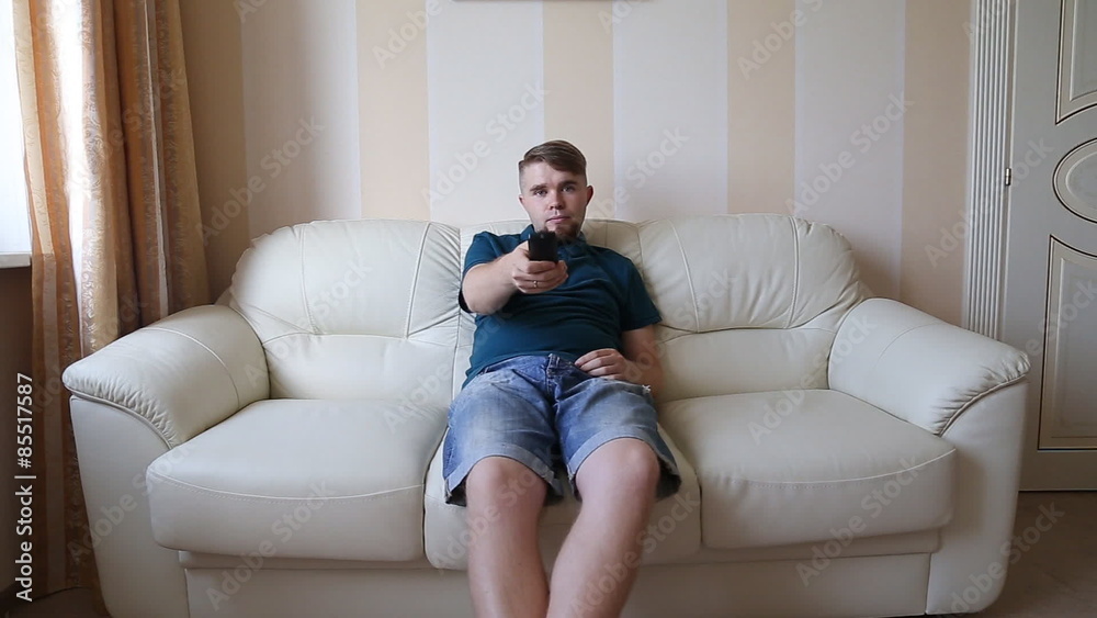 Man watching TV Man watching TV
