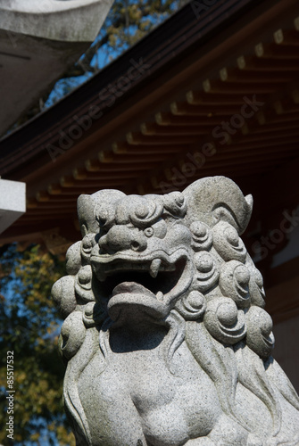 Komainu statue at a temple In Tokyo, Japan