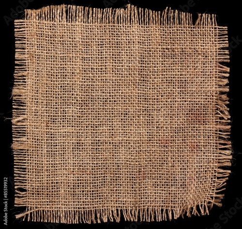 Фотография Burlap hessian square on black background
