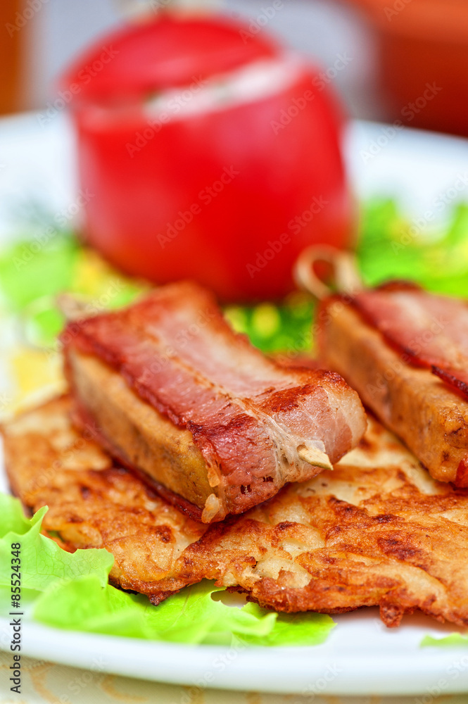 veal meat with bacon