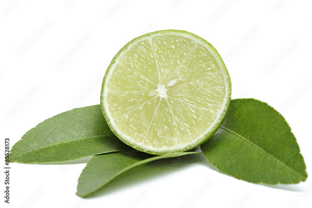 Limes with leaves isolated on white background Limes with leaves isolated on white background