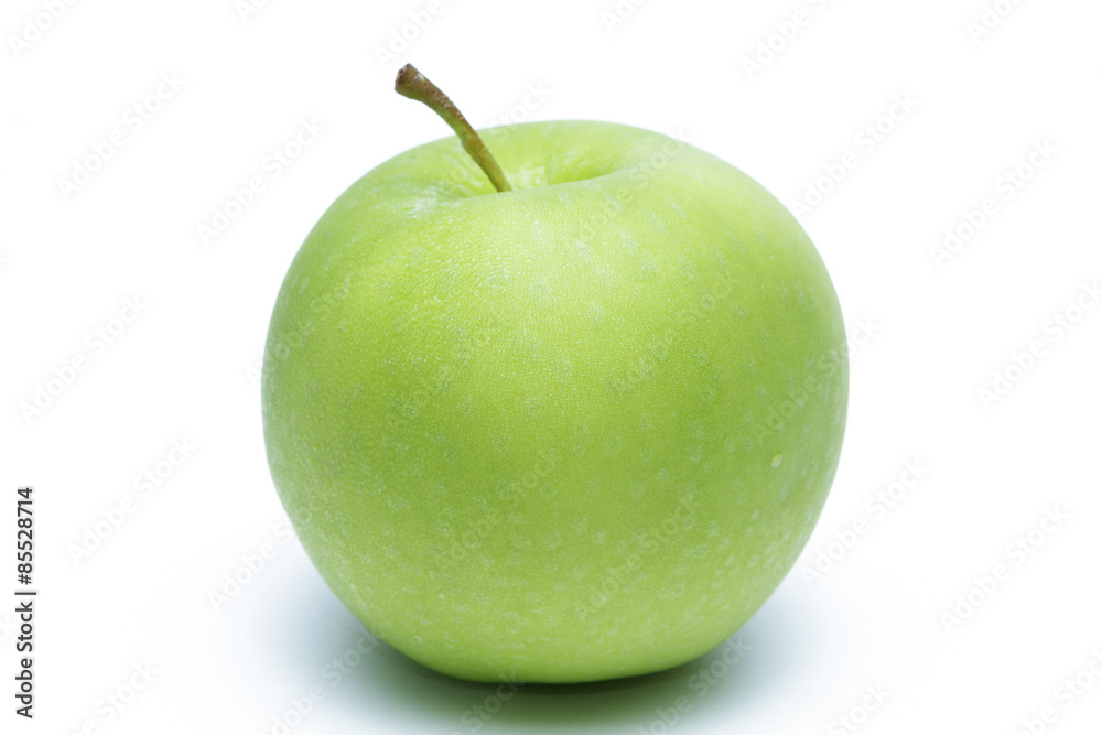 Green apple with dew  on white background