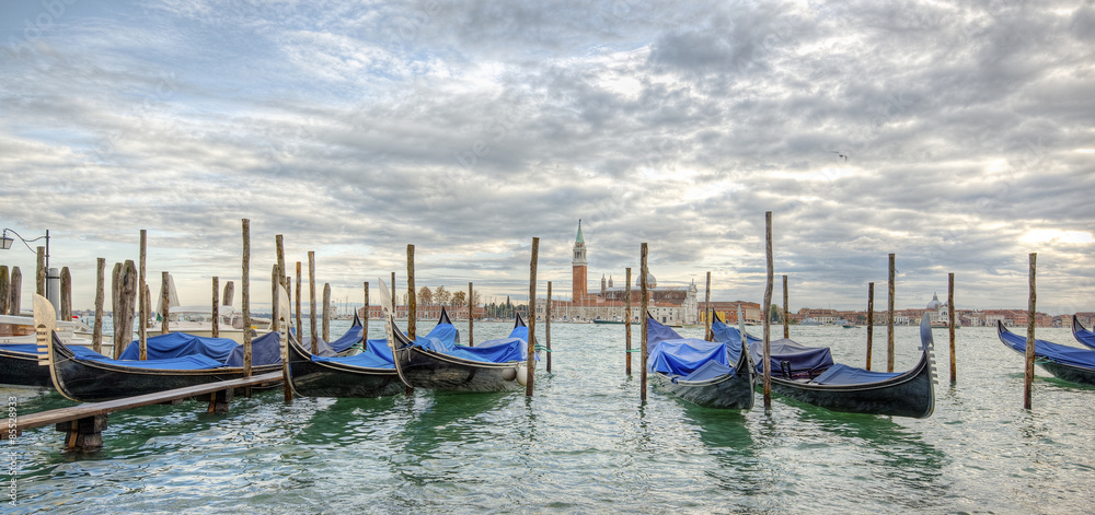 Gondolas in lagoon of Venice and San Giorgio island in background, Italy