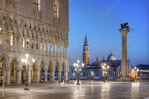 Doges Palace (Palazzo Ducale) and San Giorgio di Maggiore church in the background seen from Saint Mark square at blue hour, Venice, Venezia, Italy, Europe © AR Pictures