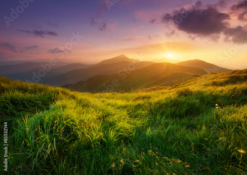 Mountain valley during sunrise. Natural summer landscape photo