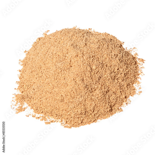 Heap of ground Cinnamon isolated on white background