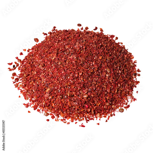 Heap of sumac isolated on white background.