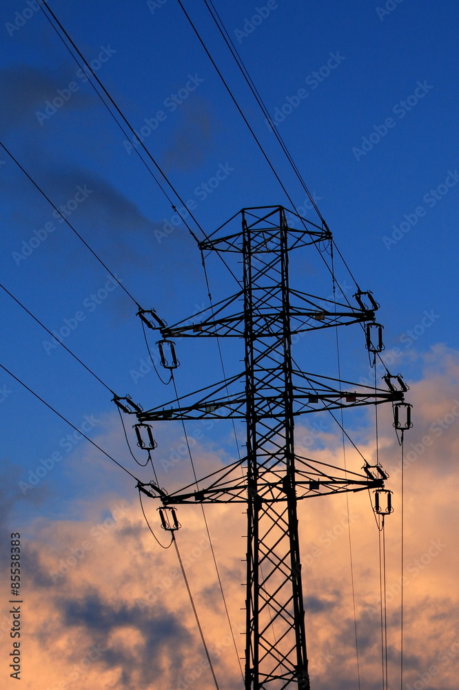 electricity infrastructure in the setting sunlight - obrazy, fototapety, plakaty 