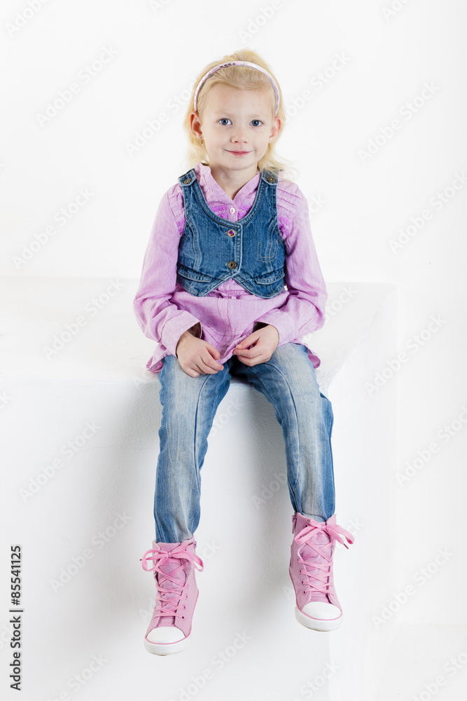 sitting little girl wearing jeans sitting little girl wearing jeans